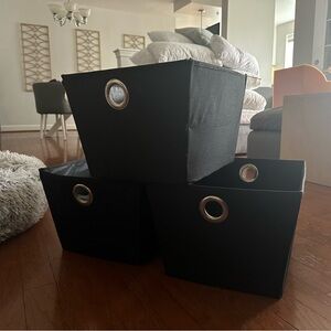 Set of three black storage bins